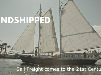 Apollonia ship with industrial freight cranes and text Windshipped: Sail Freight comes to the 21st Century"